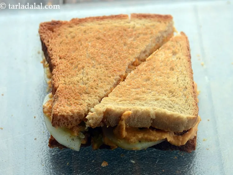 Step 27 – Cut each <strong>Lebanese toasted sandwich</strong> diagonally into 2 halves.&nbsp;