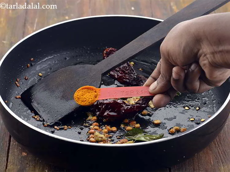 Step 18 – Add the turmeric powder.