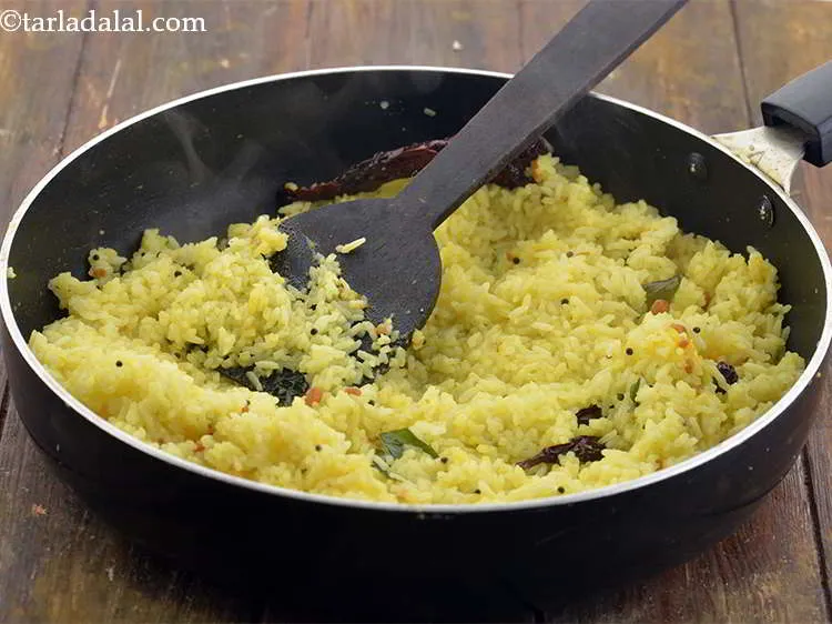 Step 23 – Mix well and cook&nbsp;<strong>Lemon Rice, South Indian Lemon Rice</strong>&nbsp;on a medium flame for 1 to …