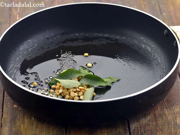 Step 13 – Add the curry leaves.