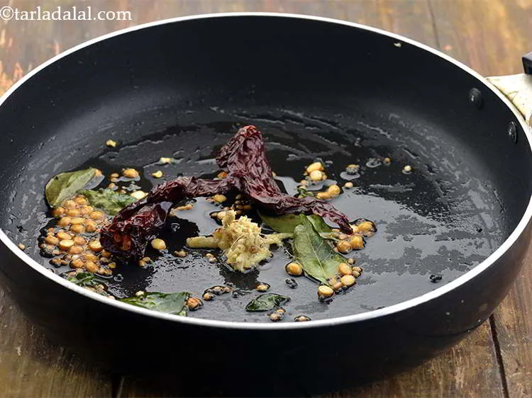 Step 16 – Add the red chillies.