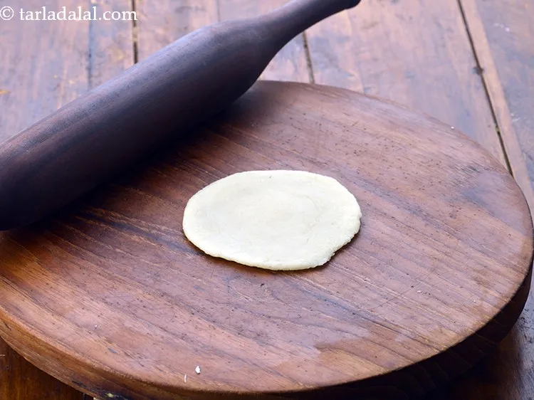 Step 24 – Roll out a portion of the dough into a 75 mm. (3&quot;) diameter circle without …