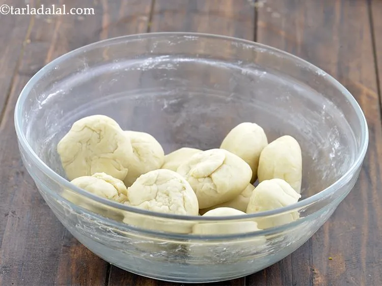 Step 23 – Divide the dough into 12 equal portions.&nbsp;