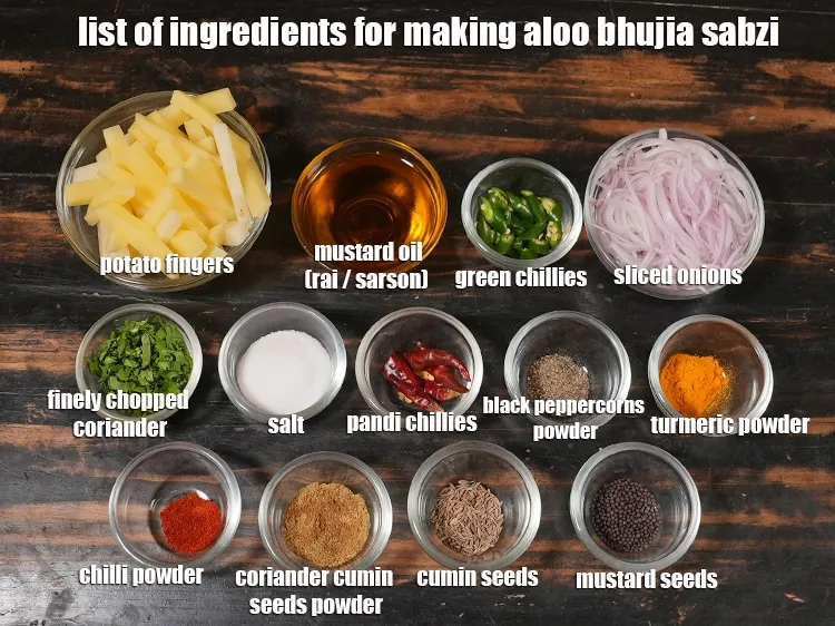 Step 2 – <u><em>See the below image of list of ingredients for making aloo bhujia sabzi.</em></u>