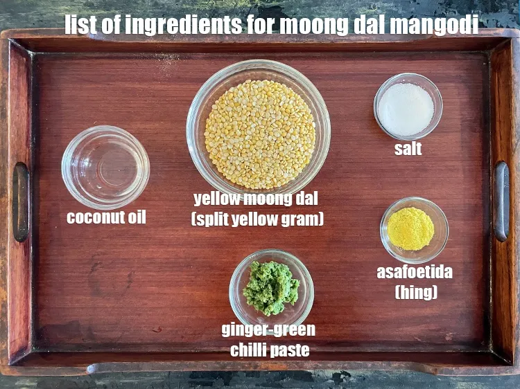 Step 2 – <strong>what is moong dal mangodi made of ?</strong> <u><em>See below image of list of ingredients …