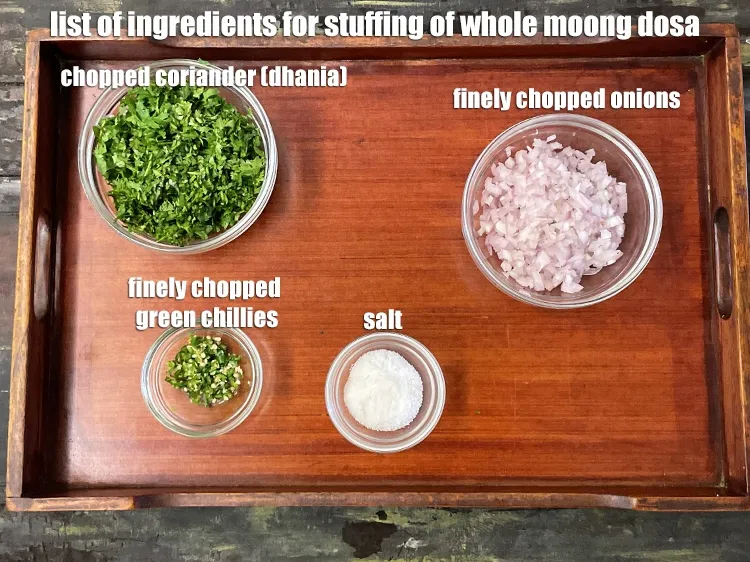 Step 3 – <strong>Stuffing for whole moong dosa</strong> made of&nbsp;<!--%3Cmeta%20charset%3D%22UTF-8%22%20%2F%3E-->1/2 cup&nbsp;finely&nbsp;chopped onions,&nbsp;1/2 cup&nbsp;chopped&nbsp;coriander (dhania),&nbsp;1 tsp&nbsp;finely&nbsp;chopped green chillies and …