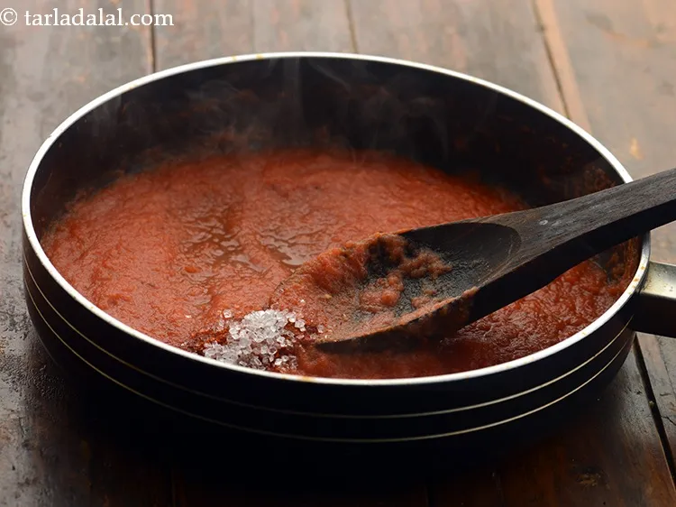 Step 10 – Add sugar to balance the tanginess of tomatoes.
