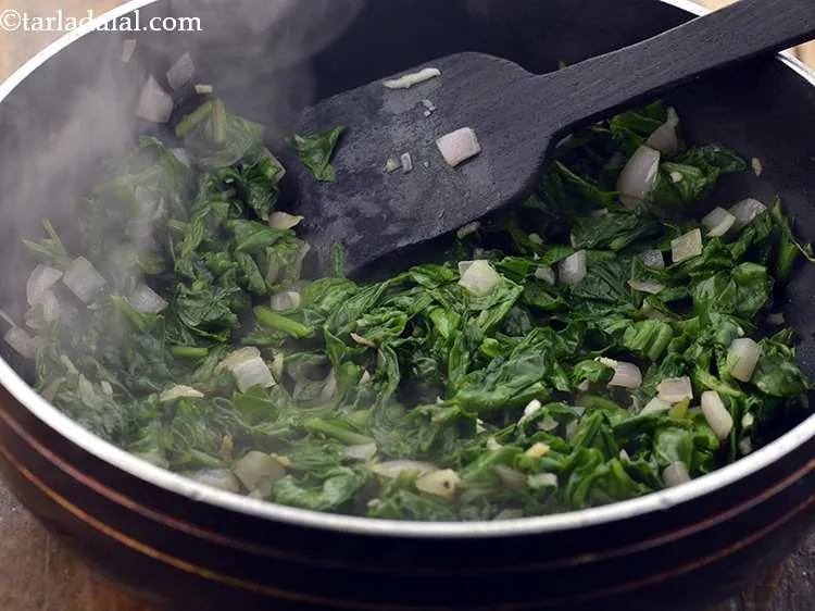 Step 9 – Saut&eacute; on a medium flame for 2 minutes or till the palak is cooked and …