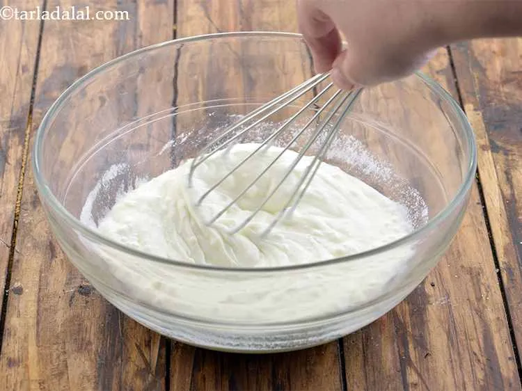 Step 2 – With the help of a whisk, beat the curd till smooth. This helps in making …