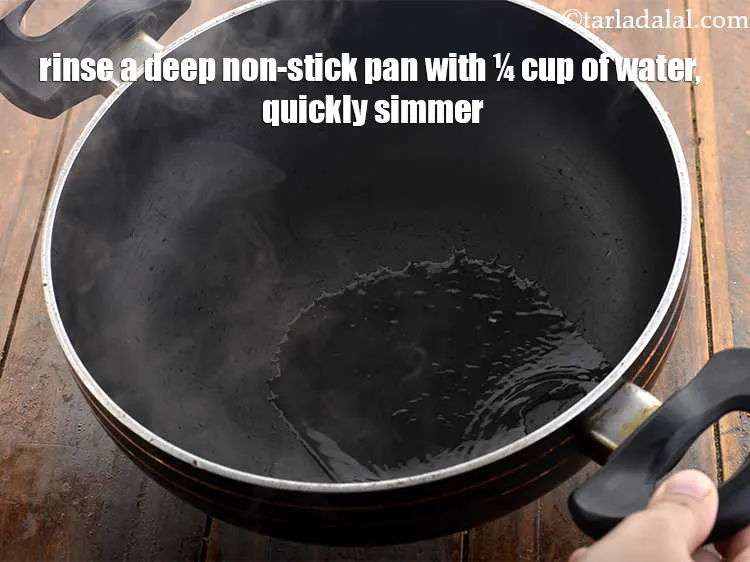Step 3 – To make<strong>&nbsp;paneer</strong>, rinse a deep non-stick pan with &frac14; cup of water and quickly simmer …