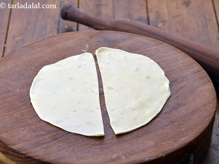 Step 52 – Cut this circle in two equal parts with help of a knife.