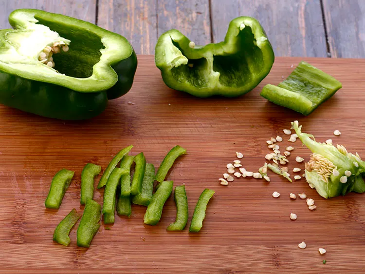 Step 34 – Add &frac12; cup sized capsicum slices.