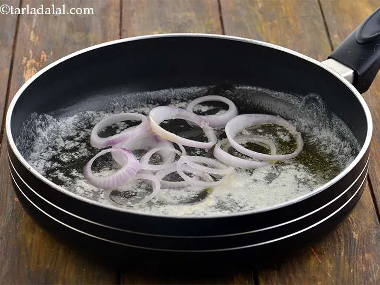 Step 12 – To this, add the onion rings.