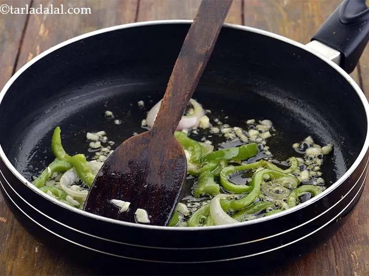 Step 17 – Mix well and saut&eacute; for 2 minutes till the rawness from the garlic goes away.