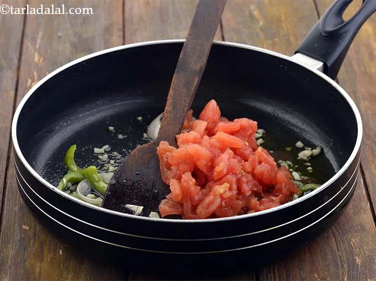 Step 18 – Add the blanched and chopped tomatoes.