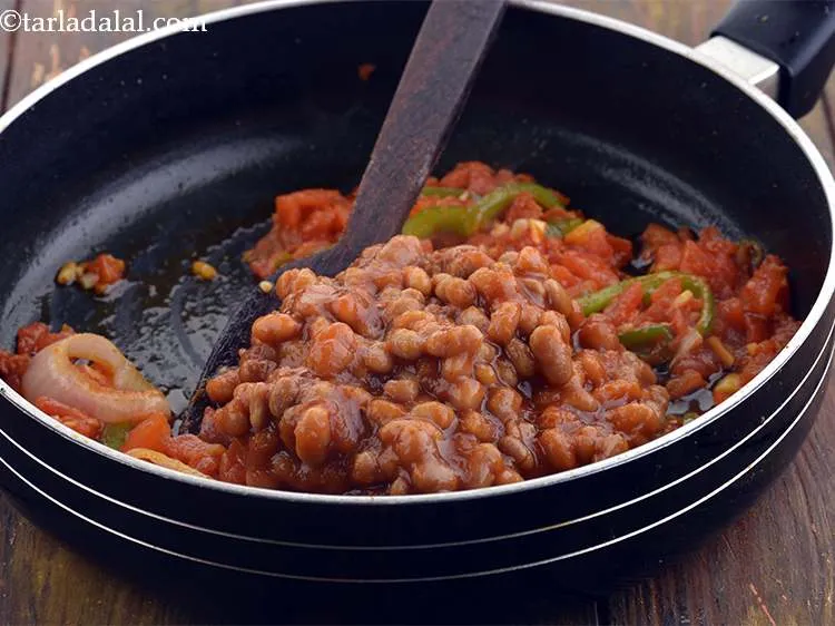 Step 21 – Add the baked beans as well.