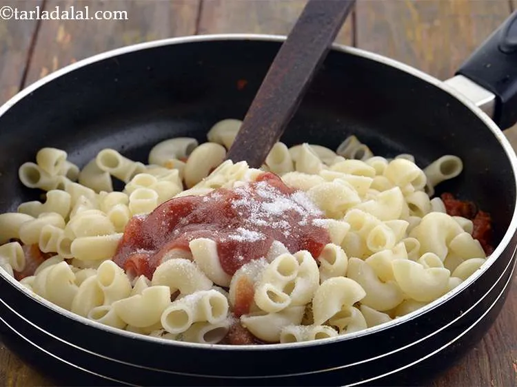 Step 24 – Finally, add salt to the <strong>Macaroni Hot pot.</strong>