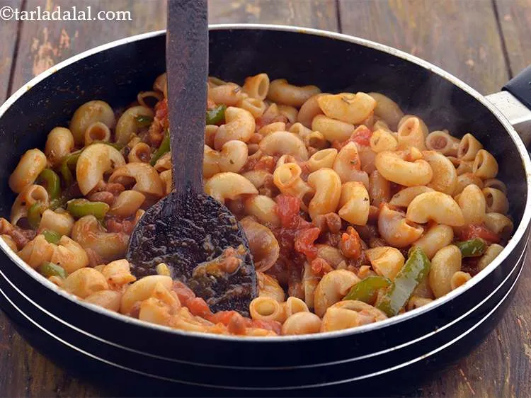 Step 25 – Mix gently and cook on a medium flame for another 2 to 3 minutes, while …