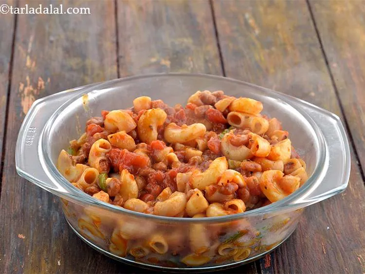 स्टेप 25 – आंच बंद करें और मिश्रण को एक गहरी बेकिंग डिश …