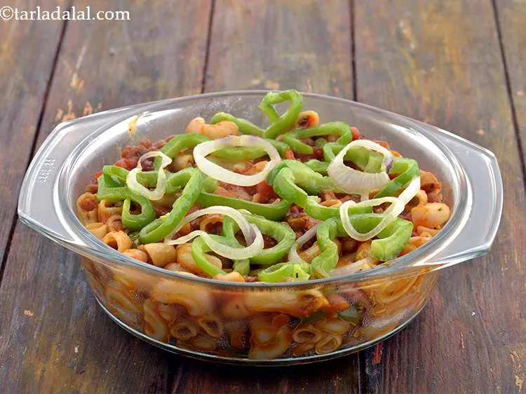 Step 28 – Arrange the prepared onion and capsicum rings on top evenly.