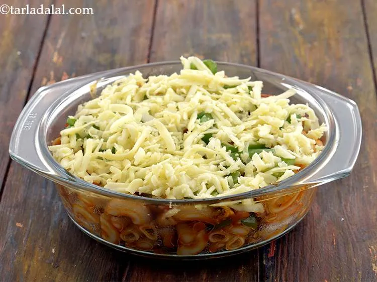 Step 29 – Sprinkle the cheese evenly over it. We have used processed cheese here, you can use …