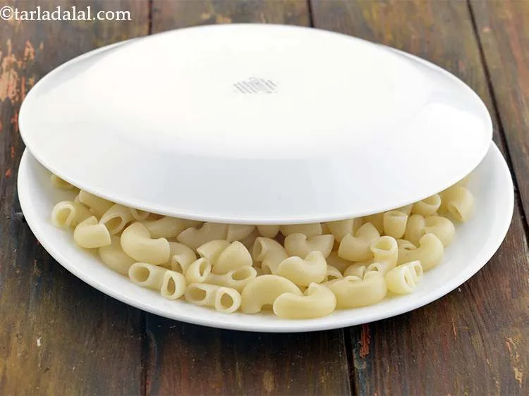 Step 10 – Cover with a lid to prevent the macaroni from drying up.