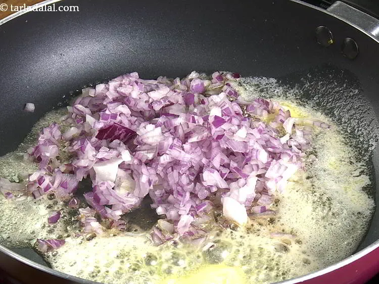 Step 9 – Once the butter melts, add onions.