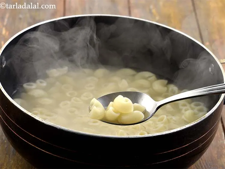 Step 6 – After 10 minutes, remove one pasta out of the water and keep it aside to …