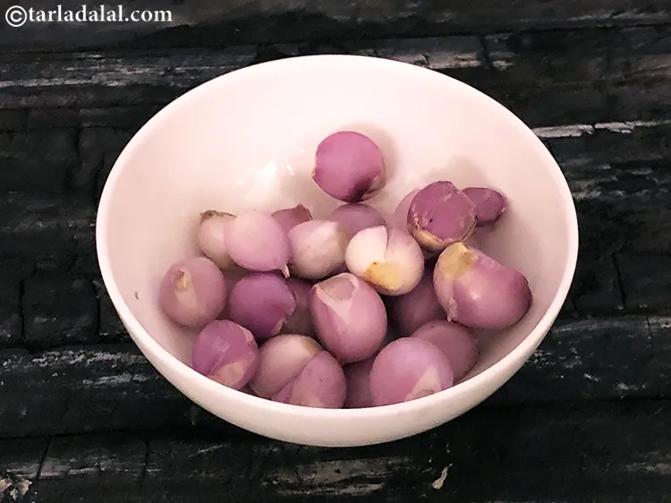 Step 4 – To make madras onion pickle, in a bowl take madras onions.