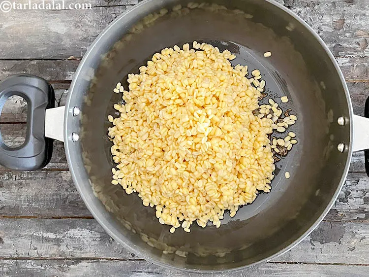 Step 17 – Add the soaked&nbsp;<meta charset="UTF-8" />1 cup&nbsp;<a href="glossary-yellow-moong-dal-split-yellow-gram-peeli-moong-dal-488i">yellow moong dal (split yellow gram)</a>. See above how …