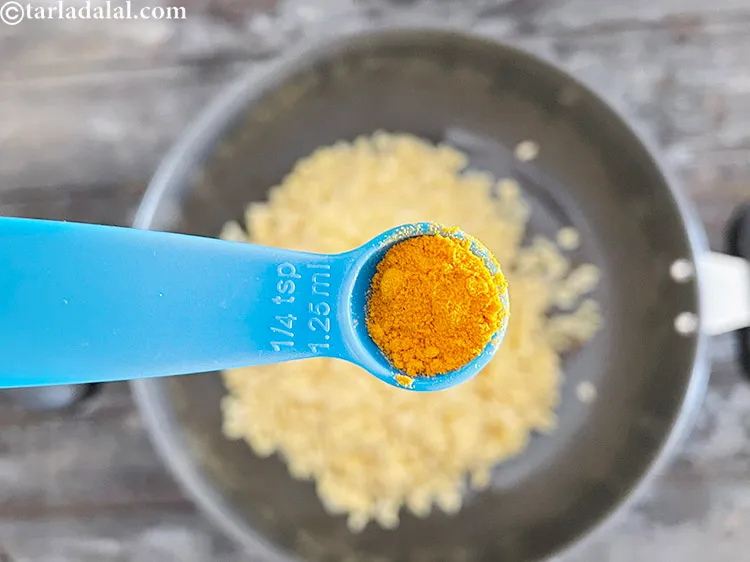 Step 18 – Add&nbsp;<meta charset="UTF-8" /><meta charset="UTF-8" />1/4 tsp&nbsp;<a href="glossary-turmeric-powder-haldi-645i">turmeric powder (haldi)</a>.