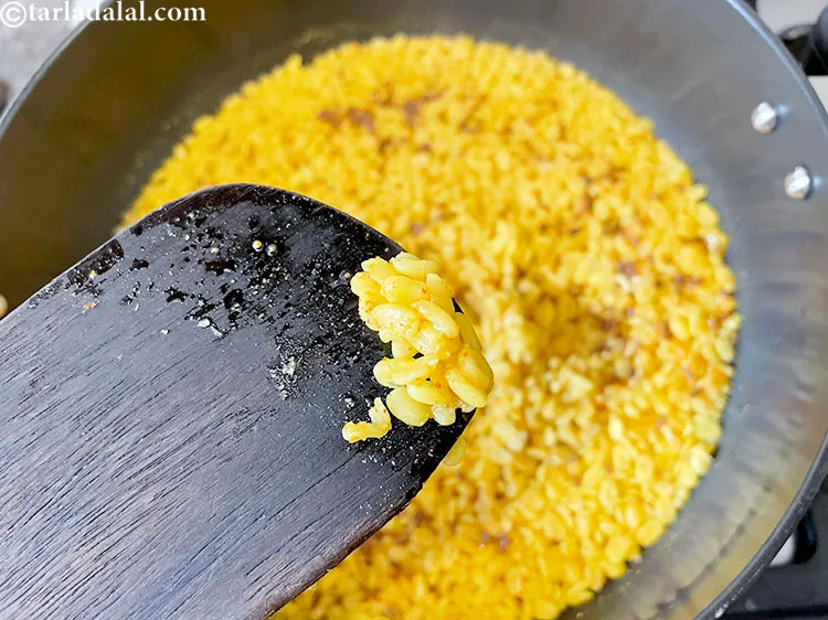 Step 26 – Now check if the dal is cooked. Press a bit between your fingers to see …