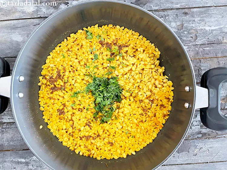 Step 28 – Add&nbsp;<meta charset="UTF-8" />1 tbsp&nbsp;finely&nbsp;<a href="glossary-chopped-coriander-783i">chopped coriander (dhania)</a>.&nbsp;Coriander is a fresh herb often used as a …