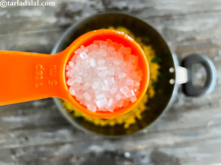 Step 31 – To that they add a pinch of sugar. Again optional.