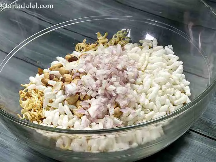 Step 8 – Add finely chopped onions. Boiled cubed potatoes, chopped raw mango can also be added.