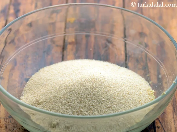 Step 7 – Add rava. It will give a nice grainy texture to our veg omelette.&nbsp;