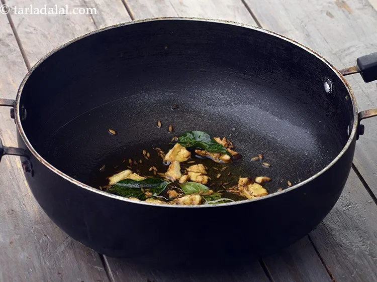 Step 8 – Further, add cumin seeds and curry leaves.