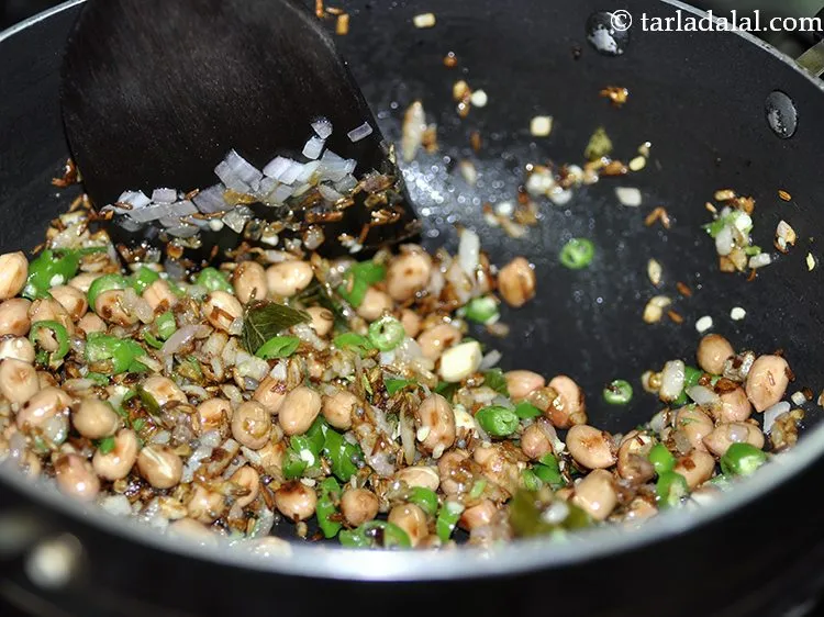 Step 33 – Add the green chillies.