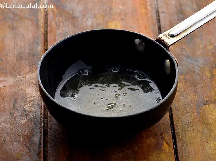 Step 22 – Add 1 tsp&nbsp;<a href="https://www.tarladalal.com/glossary-mustard-seeds-sarson-rai-sarson-ke-beej-525i">mustard seeds ( rai / sarson)</a>.