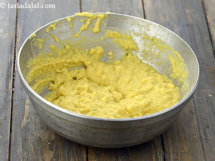 Step 15 – Mix well. The batter is ready for steaming dhoklas.&nbsp;