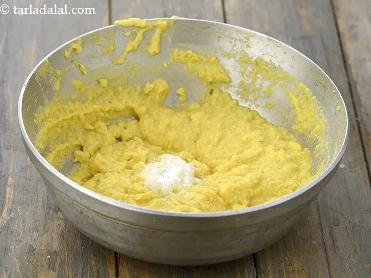 Step 17 – Mix lightly. If you mix it vigorously then the dhokla might not turn fluffy.