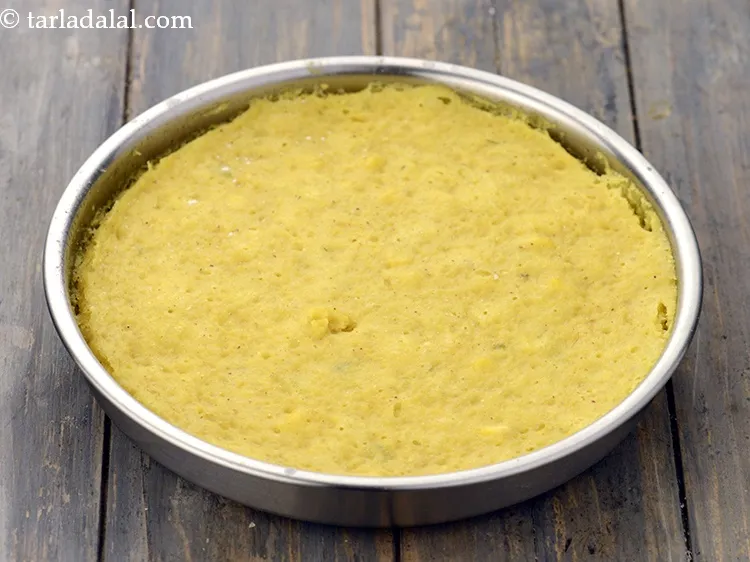 Step 19 – Steam in a steamer for 15 minutes or till the dhoklas are cooked. Keep aside …