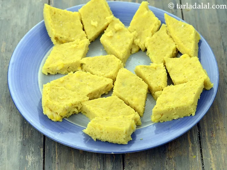 Step 20 – Once cooled, cut it into 18 diamond shaped pieces and keep aside.