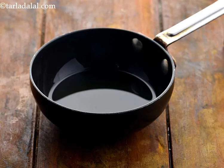 Step 21 – Heat 1 tbsp&nbsp;<a href="https://www.tarladalal.com/glossary-oil-671i">oil</a> in a small non-stick pan.