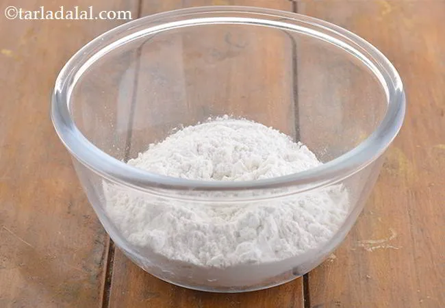 Step 17 – Meanwhile, add the maida to a small, deep bowl.