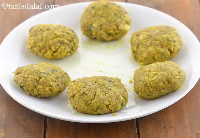 Step 21 – Take one portion between your hands and roll it into a 50 mm. (2&rdquo;) diameter …