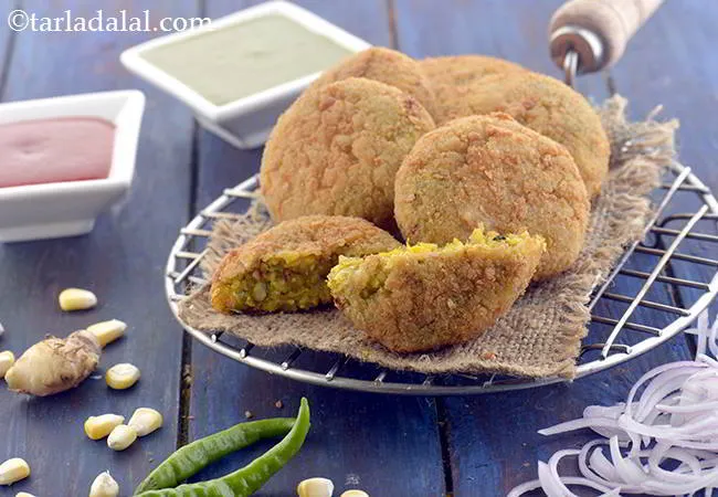 Step 27 – Serve the <strong>Makai Galouti Kebab</strong> hot with green chutney and tomato ketchup.
