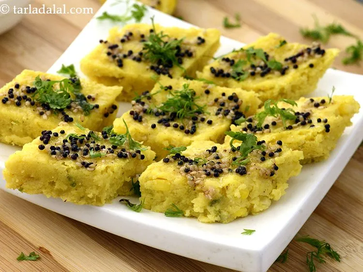 Step 27 – Sprinkle 1 tbsp&nbsp;finely&nbsp;<a href="https://www.tarladalal.com/glossary-chopped-coriander-783i">chopped coriander (dhania)</a> evenly on top.