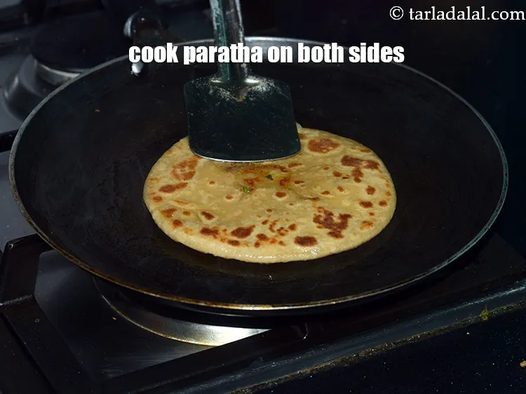 Step 44 – Cook the <strong>karela paratha recipe | Indian bitter gourd paratha | healthy stuffed karela paratha</strong> …