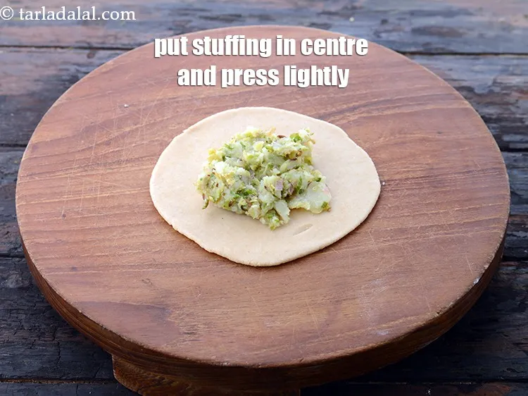 Step 37 – Roll a portion of the stuffing into a ball. Place it in the centre of …